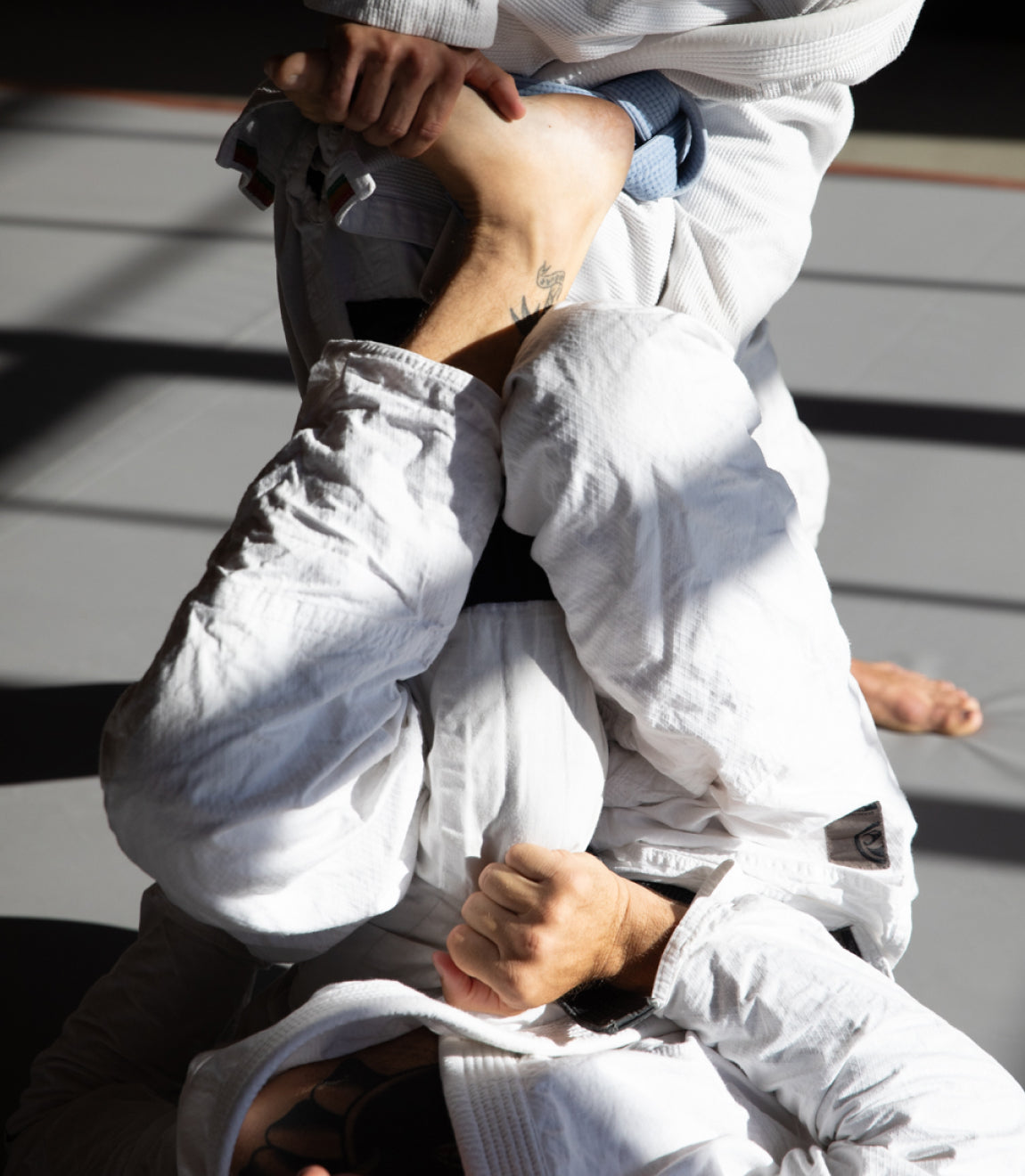 Leg lock close-up during training at Frogtown Jiu–Jitsu